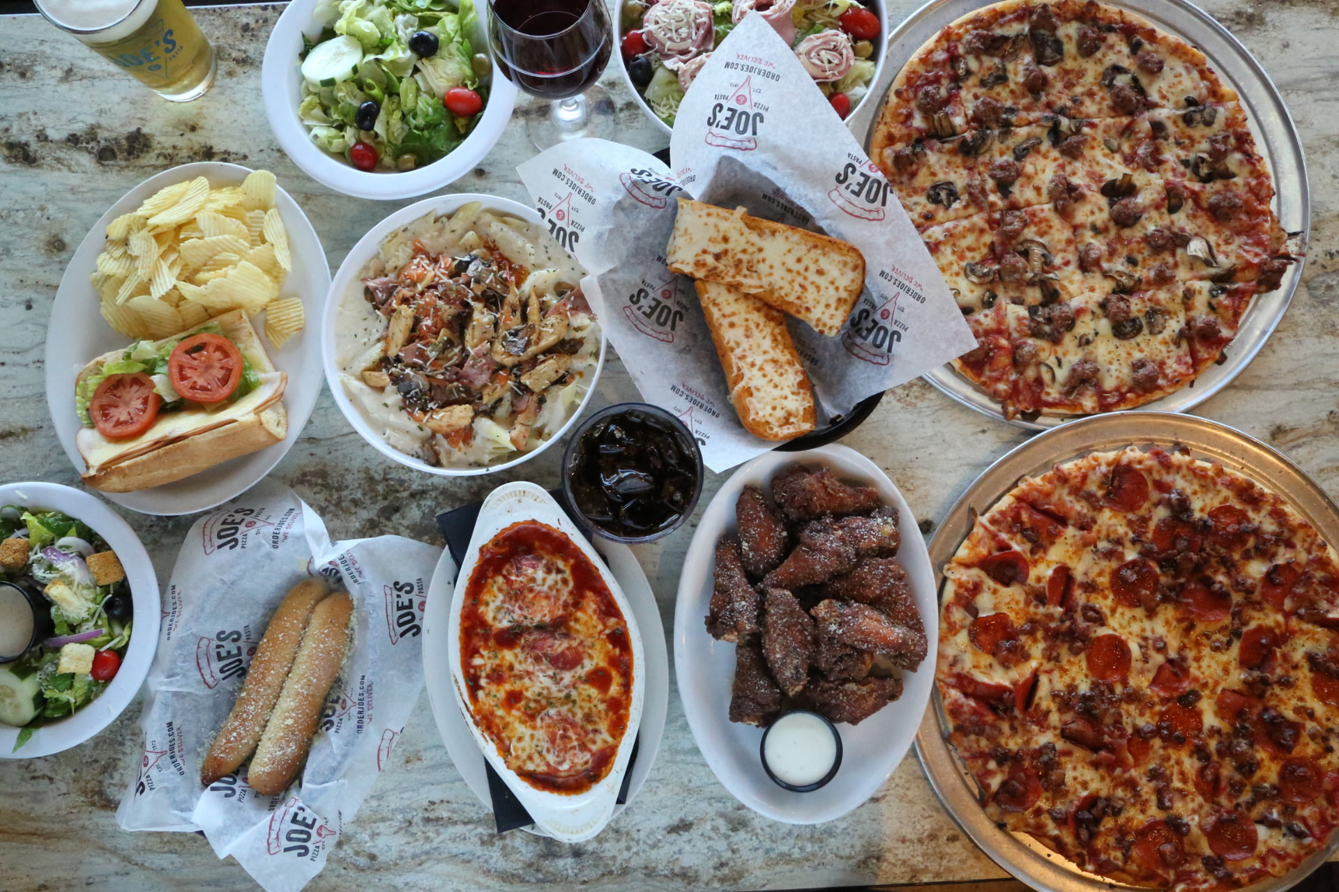 Pizza, pasta and wings spread from Joe's Pizza & Pasta in Edwardsville